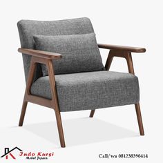 an image of a grey chair with wooden legs and armrests on the right side