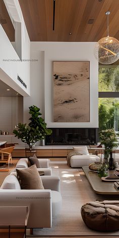 a living room filled with lots of furniture and a large painting hanging on the wall