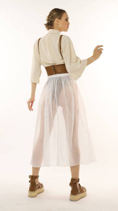 The Casual transparent organza skirt, with midi length elastic, is the perfect skirt for a casual outfit, for a photo shoot, or even an artistic event. It combines excellently with body/shirts. It's the perfect choice for creating an artistic look due to its feminine design.100% natural OrganzaOrganza is a durable fabric that is resistant to organic solvents and maintains its size and original shape.MaintenanceOrganza products can be washed in a washing machine on a gentle regime with a temperat Organza Skirt, Overlay Skirt, Feminine Design, White Skirts, Reference Photos, Art Reference Photos, Pure White, Skirt Outfits, Casual Outfit