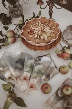 an apple pie sitting on top of a table