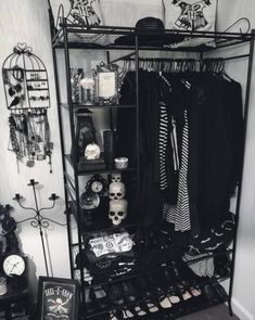 a black and white photo of an organized closet