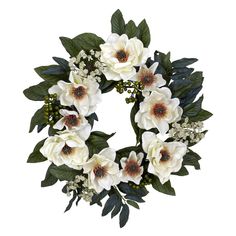 a wreath with white flowers and green leaves