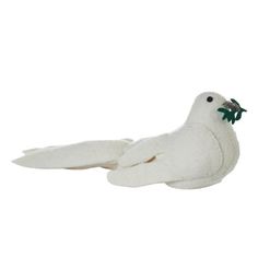 a white stuffed bird with a green beak