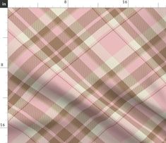 a pink and brown plaid pattern on fabric