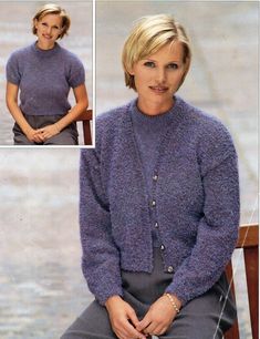 a woman sitting in a chair wearing a purple sweater and grey pants with her hands on her hips