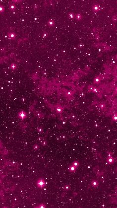 an image of stars in the sky with purple hues and pink spots on them