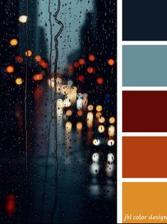 rain drops on the window and city street lights in the background with color swatches