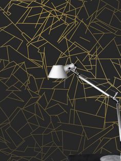 an image of a black and white wallpaper with gold lines on the back ground