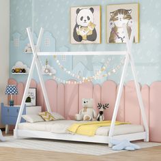 a child's bedroom with pink and blue walls, white bed frame, teddy bear on the pillow