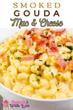 a bowl filled with macaroni and cheese covered in bacon