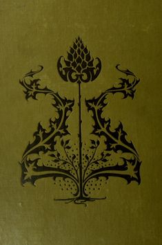 an old book with ornate designs on it