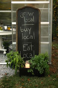 a sign that says grow local buy local eat local