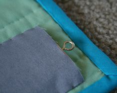 a piece of fabric with a ring on it