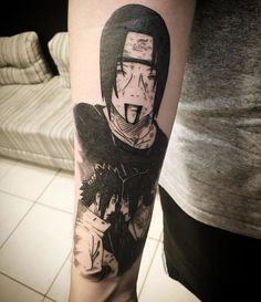 a person with a tattoo on their arm that has an image of the character naruta