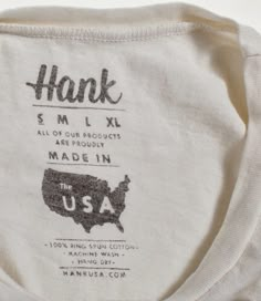 a white t - shirt with the words hank printed on it