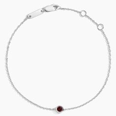 Garnet Bezel Bracelet - Silver. Both elegant and timeless, this bracelet features a charming bezel-set garnet on a delicate cable chain. The length of the chain can be adjusted to 6, 6.5, or 7 inches to suit individual preference. Bezel Bracelet, The Chain, Bracelet Silver, Bezel Setting, Eternity Ring, Cable Chain, Silver Bracelets, Quality Jewelry, Garnet