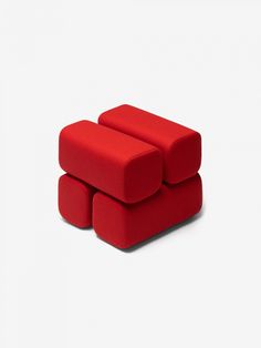 three red couches sitting on top of each other in front of a white background