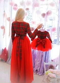 Red plaid ChristmasChristmas mommy andMommy and meRed check patternXmas dressesMother and daughterMother matchingPlaid holiday dressChristmas card photoPlaid photoshootRed plaid maxi dressBaby girl ChristmasInfant dress holiday Absolutely Christmas holiday set for you and your girl! It's stylish set crafted for women and girl with boat neck and full sleeves.  This set has plaited pattern and having cotton red plaid waist ribbon that makes the dress pretty and comfy.  Baby girl dress also has detachable sequin shiny bow. Tulle skirts for both.  Mommy dress is maxi length, girl dress is tea length. Model display sizes M and 9-12 months.  Skirts can be done in different  colors. We have wide over 80 colors swatch. Color of dresses can be other  We have more then 80 shades of tulle colors. And Dresses For Christmas Party, Mother Daughter Matching Dresses, Girls Red Christmas Dress, Plaid Christmas Dress, Mommy Dress, Daughter Photography, Mom Daughter Outfits, Xmas Outfit, Mother Daughter Fashion