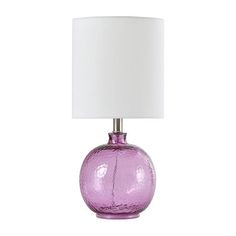 This glass table lamp brings a touch of antique beauty to any master suite. The translucent finish brings a fun, exciting quality to the fixture. The shade is constructed from white fabric and complements the glass body.Included: 1 Lamp Shade(s)Light Bulb Base: E26 Medium (standard)Light Bulb Type: IncandescentNumber of Light Bulbs: 1Power Source: Plug-InShape: EmpireSwitch Type: On/Off SwitchUl Location Rating: DryWattage (watts): 60wMeasurements: 9.5 Width/Inches, 9.5 Depth/Inches, 20 Height/InchesCord Length (ft.): 5 FtShade Height: 10 InWeight (lb.): 1.5 LbAssembly: Assembly RequiredBase Material: 100% GlassShade Material: LinenCare: Wipe CleanDecor Styles: TraditionalCertifications And Listings: Ul ListedMaterial: GlassCountry of Origin: Imported Purple Table Lamp, Lavender Room, Purple Table, Lamps Table, Big Girl Rooms, Bright Purple, Light Bulb Types, Purple Glass, Glass Table Lamp