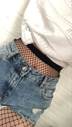 Crop Top Hoodie Outfit Jeans, Black Shorts With Fishnets, Fish Net Tights Outfit Shorts, Fishnets With Shorts, Fish Nets Outfit, Ripped Jeans With Fishnets, Fishnet And Jeans, Fishnets Outfit, Tights Under Jeans