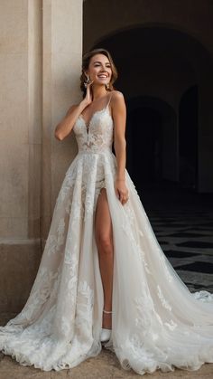 a woman in a wedding dress leaning against a wall