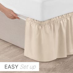 the easy set - up bed skirt is made from an old mattress