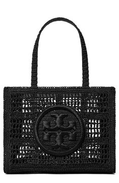 Crocheted raffia and a wrapped double-T logo add a breezy flourish to your on-the-go style when you step out the door with this whimsical tote. Open top Top carry handles Structured silhouette with flat base for stability Paper straw with raffia and polyurethane trim Imported Tori Burch, Tory Burch Kira Chevron, Vince Clothing, Kira Chevron, Tory Burch Ella, Tory Burch Kira, Large Leather Tote Bag, Watch Trends, Straw Tote Bag