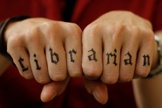 two fingers with the word librarian written on them