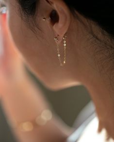 "Gold Chain Stud Earrings Small 3mm Ball Stud chained to the backing Wear them both or wear them solo ! -The chain measures 1.5\" -Sold as a pair --------------------------------------- ■ GIFTS / PACKAGING * If you want each item in all separate boxes, Leave us a note! Otherwise, your order will be shipped in one box as layered set. --------------------------------------- ■ OUR POLICIES ◦ Earrings and Body Chain/Belly chains are non-returnable https://www.etsy.com/shop/EandEProject/policy?ref=sh Edgy Earrings, Chain Earring, Long Gold Earrings, Tiny Stud Earrings, Small Earrings Studs, Chain Earrings, Gold Filled Chain, Minimalist Earrings, Gold Earrings Studs