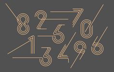 the numbers are shown in gold on a dark background with lines and shapes around them