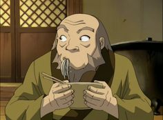 an old man eating from a bowl with chopsticks