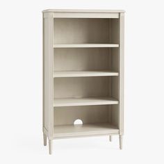 an empty white bookcase with three shelves