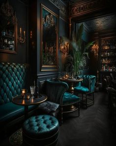 a dimly lit room with blue velvet chairs and tables