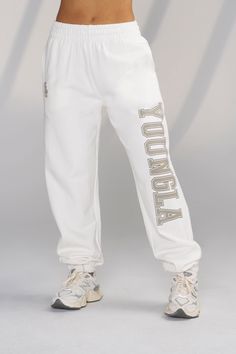 MATERIAL: 100% cotton. FIT: True to size﻿ DESIGN: ﻿These joggers are inspired from our first drop ever where we introduced “Script Joggers”. They have a three tier waist band that makes your waist look snatched. The joggers have a college campus font that says YoungLA. This is a great comfy jogger for everyday that comes with a matching Baby tee to complete your look!﻿ MODEL: The model in the first photo is 5'4", with bust size 32, waist size 27, and hip size 37.5, and wears size Small. Youngla Joggers, Sporty Blue Joggers For Streetwear, Gym Sportswear Joggers With Letter Print, Comfortable Blue Joggers For Streetwear, Blue Cotton Joggers With Letter Print, Named Collective Joggers, Matching Baby, College Campus, One Drop