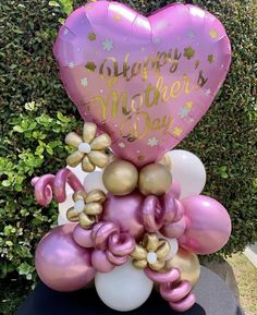 a bunch of balloons that say happy mother's day