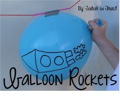 a person holding a balloon with the words balloon rockets written on it and string attached to it