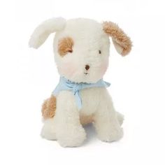 a small stuffed animal with a blue ribbon around its neck