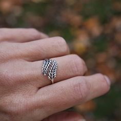 Pay homage to the delicate beauty of ferns with this adjustable sprig leaf ring. The round-tipped leaves are graduated in size and gently curl from the center stem to form a curling tendril that looks delightful with other nature rings. Sterling Silver Sizing starts at size 7, adjustable We recommend adjusting this ring to the correct size and then leaving it alone. Excessive opening and closing can weaken the band and create cracks and possible breakage. Nature Rings, Rings Sterling Silver, Fine Gold Jewelry, Gemstone Meanings, Nature Ring, Jewelry Post, Delicate Beauty, Leaf Ring, Stacked Jewelry