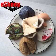 an assortment of different types of shoes on a plate with the words e - sheep designs