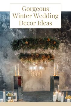 the cover of gorgeous winter wedding decor ideas, with candles and greenery hanging from the ceiling