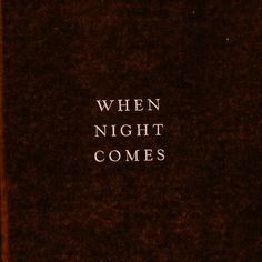 a red book with the words when night comes written on it's front cover