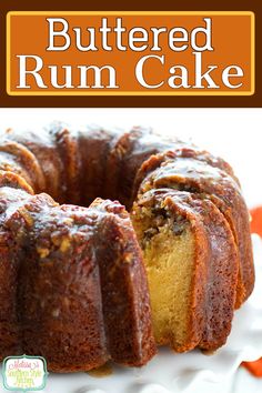 a bundt cake on a white plate with the words, buttered rum cake