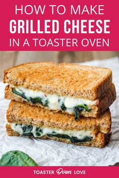 two grilled cheese sandwiches stacked on top of each other with the text toaster oven grilled cheese