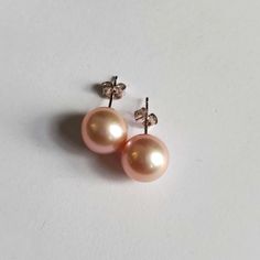 Metal: 14k Gold. Style: Earrings. Measurements: See Pictures. For: Men And Women. Description: Introducing The *Blushing Elegance* 14k Gold Pink South Sea Pearl Earrings, A True Embodiment Of Luxury And Sophistication. These Exquisite Earrings Feature Lustrous, Round South Sea Pearls With A Delicate Blush Pink Hue That Shimmers With An Inner Glow. Renowned For Their Rarity And Exceptional Beauty, South Sea Pearls Are Some Of The Most Sought-After Pearls In The World, And These Pink Variations Offer An Extra Touch Of Romantic Charm And Femininity. Set On 14k Gold Posts, These Earrings Provide The Perfect Blend Of Warmth And Elegance, Enhancing The Soft, Iridescent Luster Of The Pearls. The G Pink Pearl Jewelry, South Sea Pearls Earrings, Inner Glow, Sea Pearl, Sea Pearls, South Sea Pearls, South Seas, Pink Pearl, Style Earrings