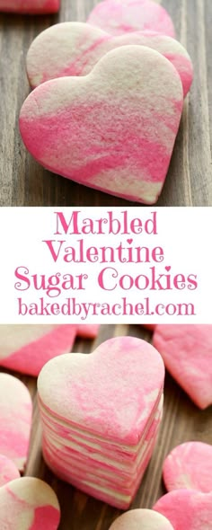 heart shaped sugar cookies with pink and white frosting on top, in the shape of hearts