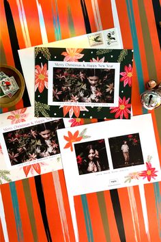 two photographs on top of an orange and black striped table cloth