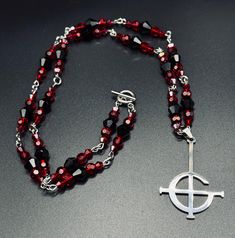 Ghost Grucifix necklace, stainless steel, 25 inches long. Made by me 🖤 Ghost Necklace, Red Ghost, Rosary, Bead Charms, Necklace Etsy, Black Red, Ghost, Black And Red, Accessory Gift