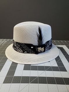 "Garcia Hat White traditional derby fedora lowrider hat made of 100% woven finest cotton string comes with black bandana band, 2\" brim. Also comes with a silk inside liner, real rooster feather, pearl pin and Smile now cry later lapel hat pendant." Adjustable Short Brim Sun Hat For Streetwear, Custom Adjustable Summer Hat Bands, Adjustable Flat Bill Sun Hat For Kentucky Derby, Festival Top Hat With Short Brim, Adjustable 5-panel Hat For Rodeo, Adjustable 5-panel Rodeo Hat, Adjustable Fitted Hat With Short Brim For Summer, Black Flat Bill Hat Bands For Summer, Classic 5-panel Summer Hat