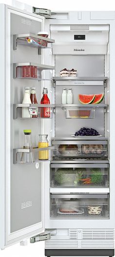 an open refrigerator with food and drinks in it