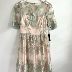 Nwt Beautiful Floral Embroidered Dress From Anthropologie. Never Been Worn, Perfect Condition. Spring Embroidered Dress For Wedding Guest, Spring Formal Embroidered Lace Dress, Formal Embroidered Dress With Floral Embroidery And Short Sleeves, Spring Embroidered Knee-length Lace Dress, Spring Wedding Lace Dress With Floral Embroidery, Spring Short Sleeve Lace Embroidered Dress, Spring Embroidered Short Sleeve Lace Dress, Evening Floral Embroidered Short Sleeve Dress, Floral Embroidered Short Sleeve Evening Dress